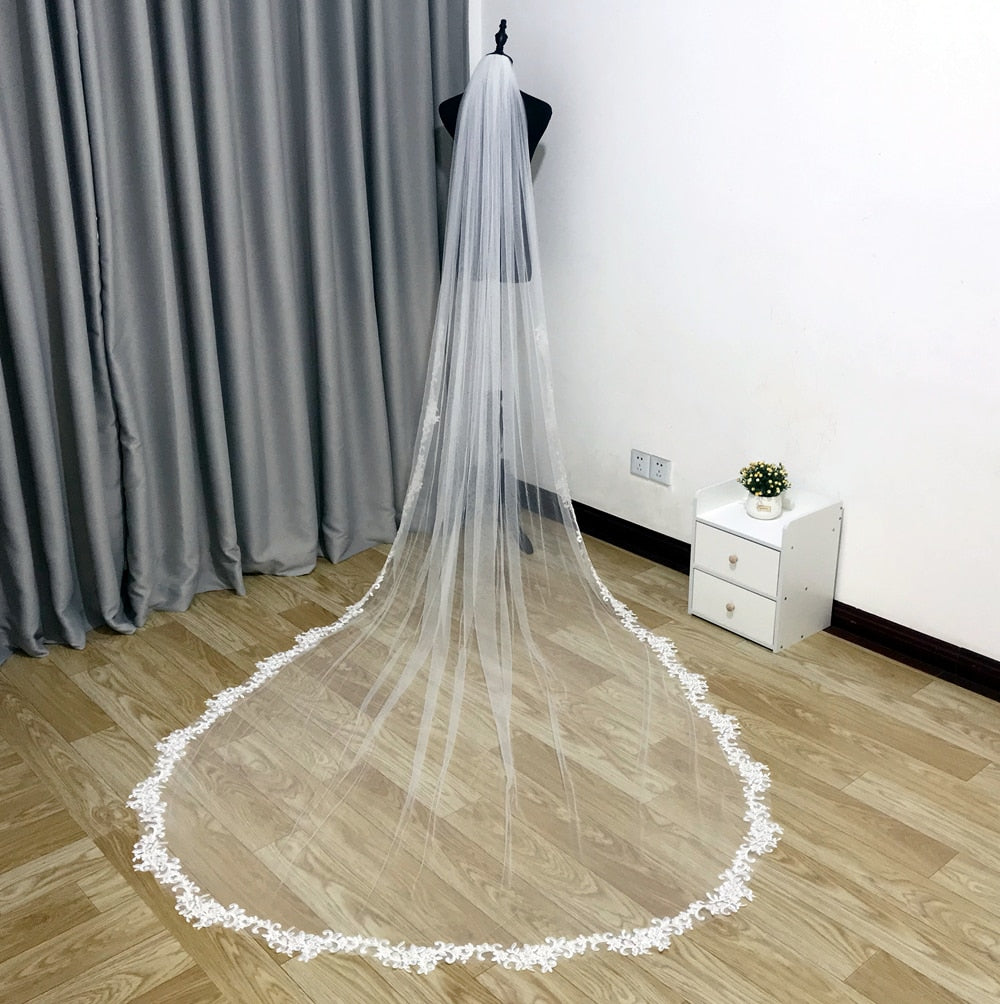 https://nirvana14.com/cdn/shop/products/2020-Real-Photos-White-Ivory-Wedding-Veil-3-Meters-Long-Comb-Lace-Mantilla-Cathedral-Bridal-Veil_2000x.jpg?v=1622797743